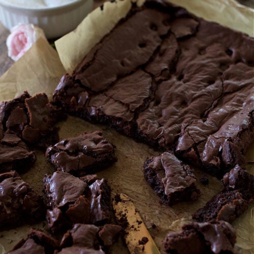 brownies on parchment paper on on counter.