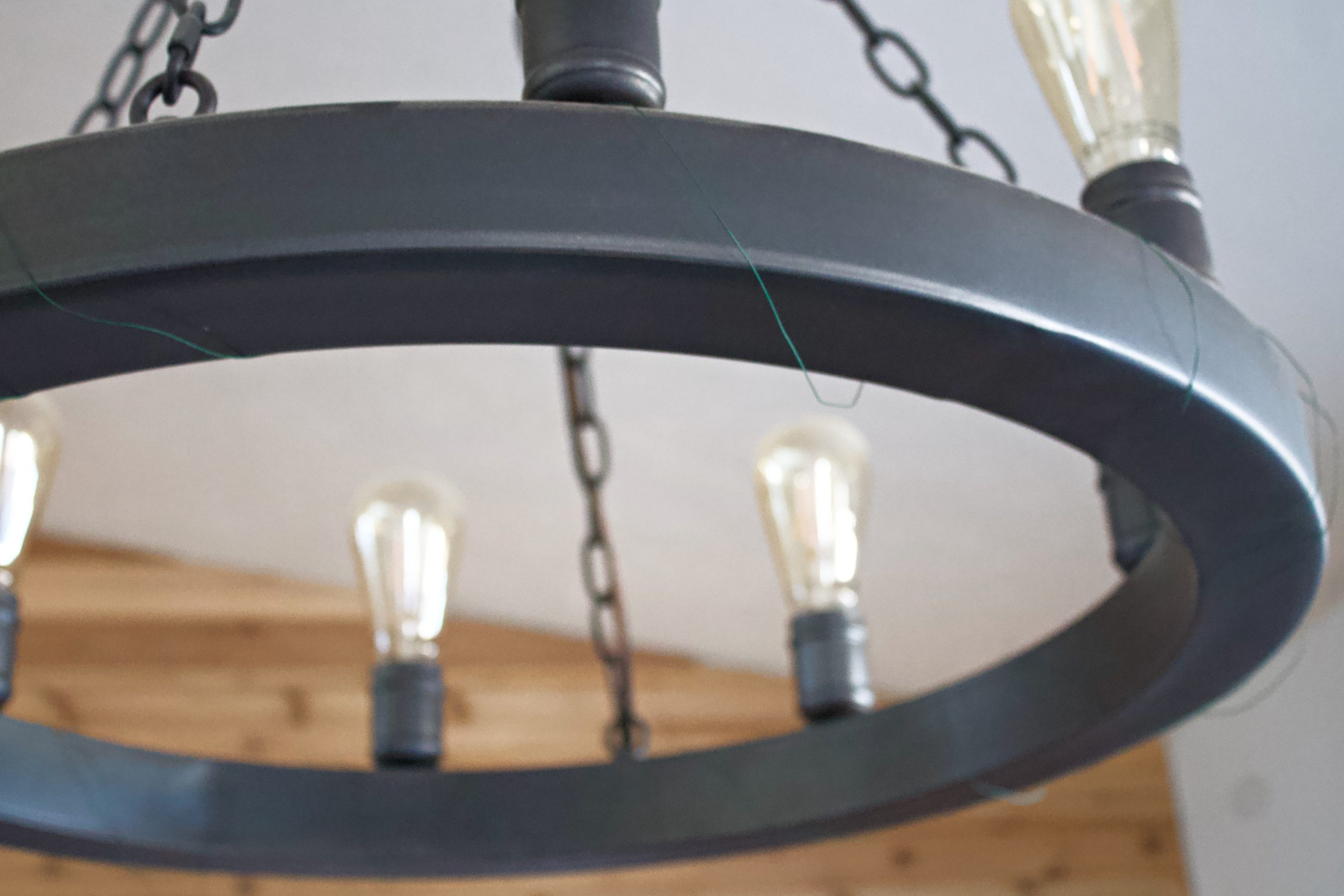 Chandelier wired and ready for garland picks to be inserted. 