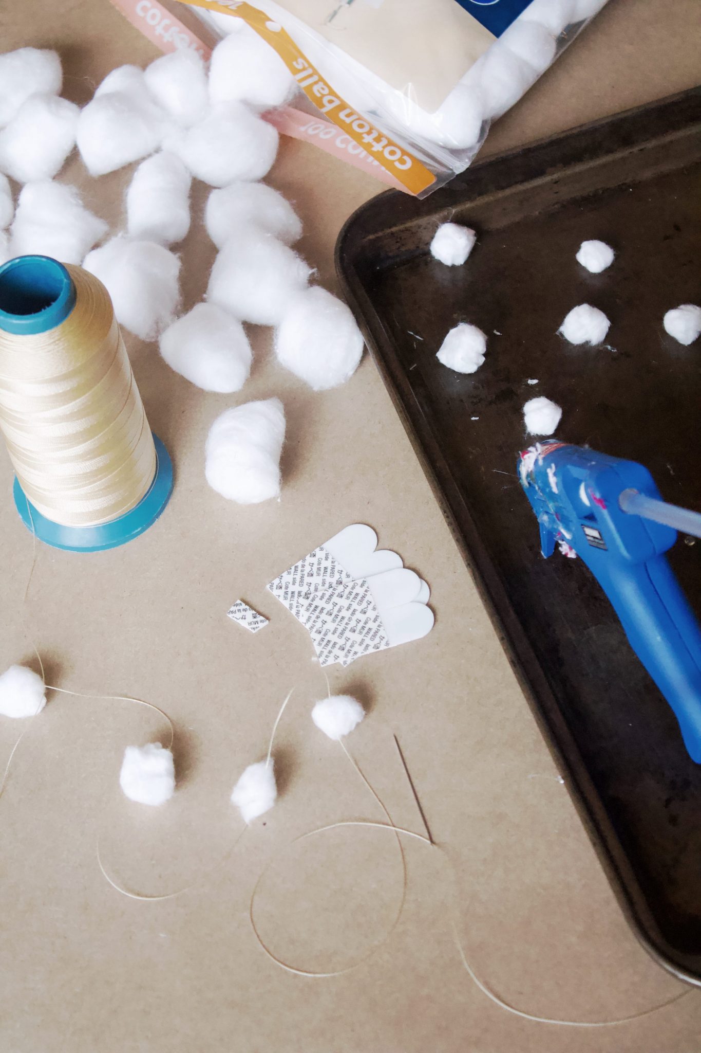 Snow Garland with Cotton Balls and String Creating a Winter Wonderland