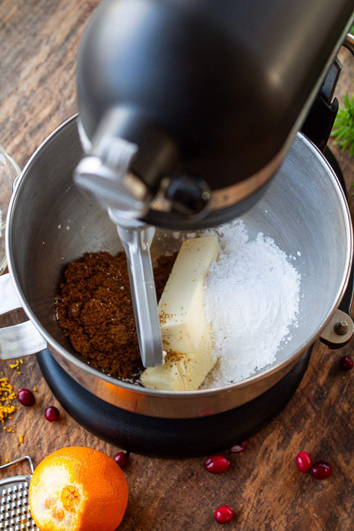 butter, powdered sugar, and brown sugar in Kitchen-aid mixer.