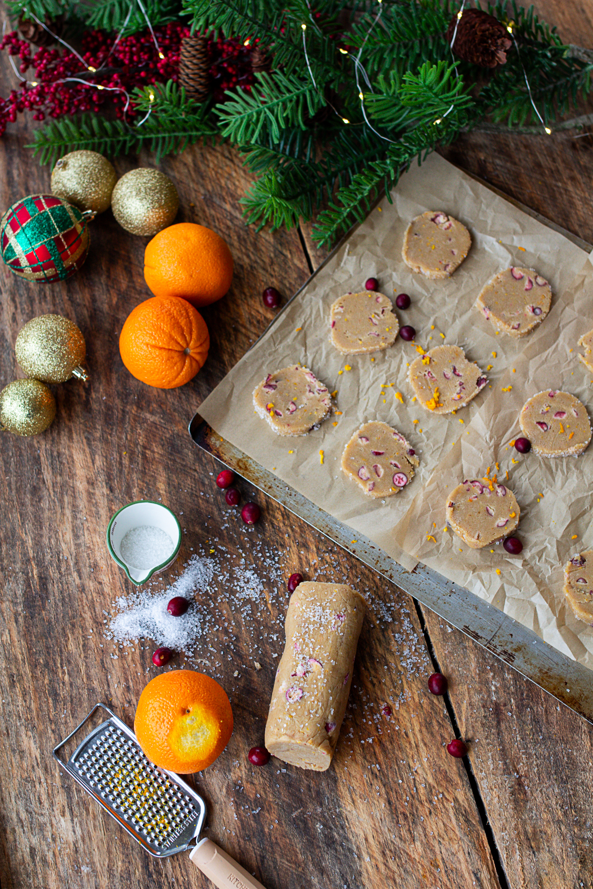 cookie dough sliced onto cookie sheet ready to bake.