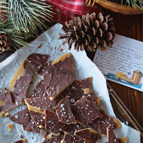toffee in parchment paper on the counter.