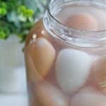 eggs in a half gallon jar for preservation.