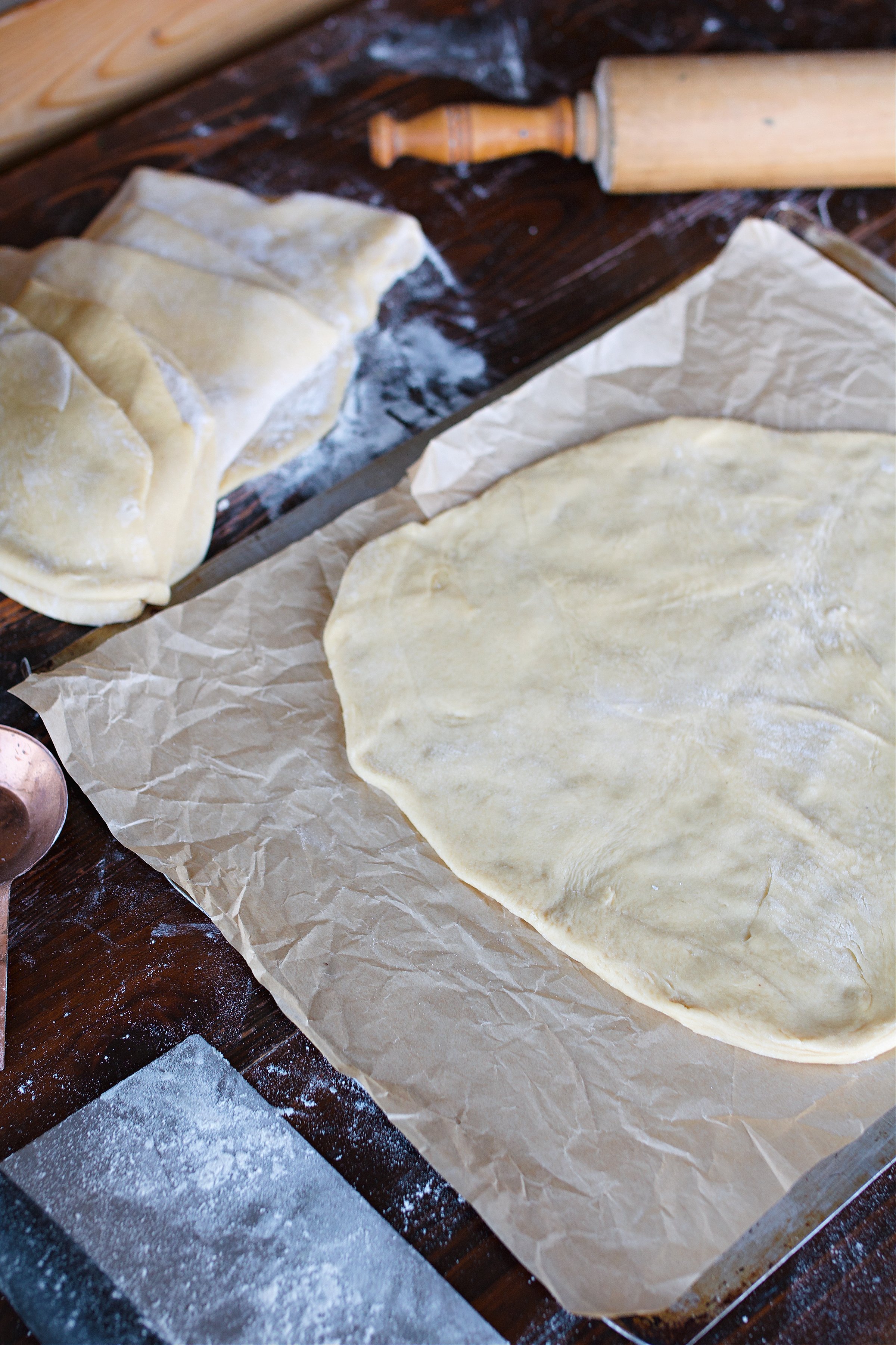 Dough being rolled out onto counter