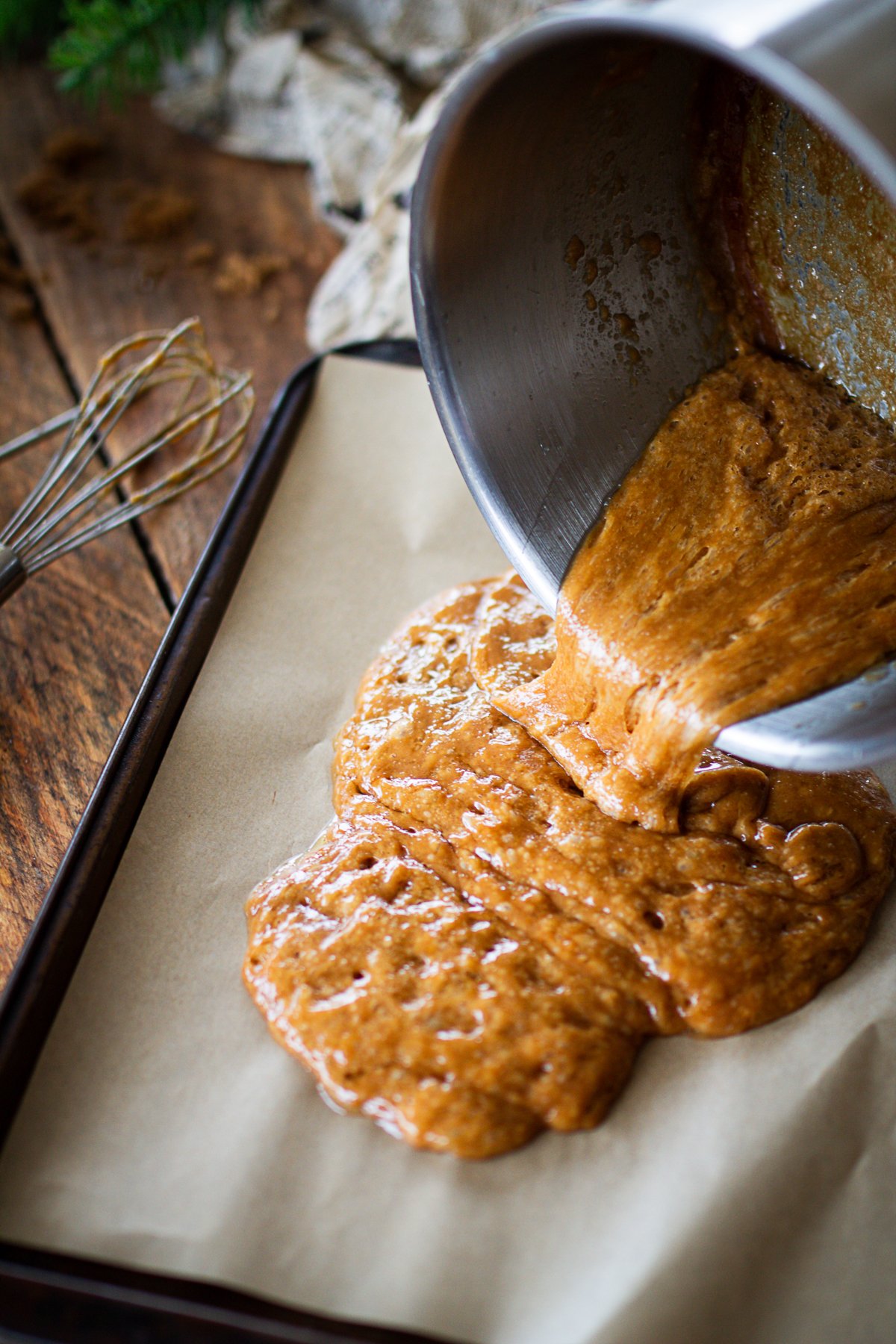 Pouring toffee into dish to set.