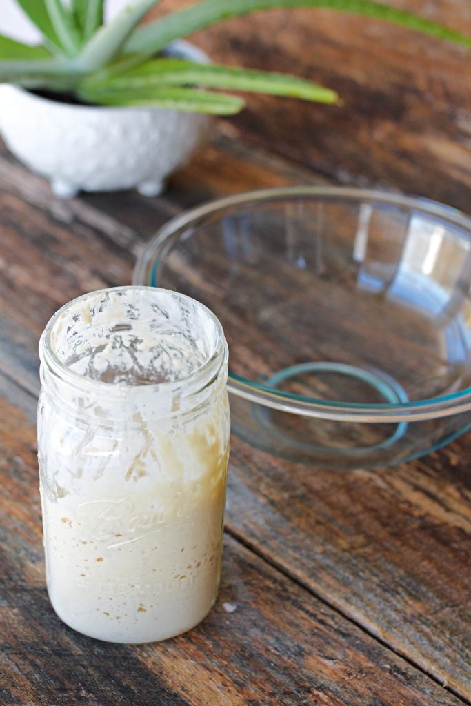 sourdough starter in a quart jar on a counter.