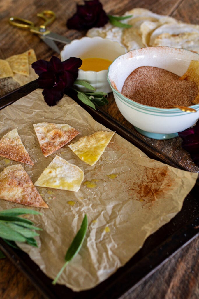 laying the sugar cinnamon chips on a cookie sheet to bake.