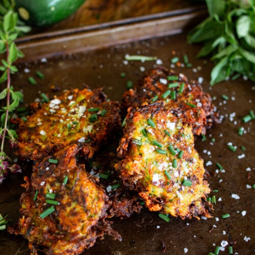 Zucchini fritters on pan fried and ready to eat.
