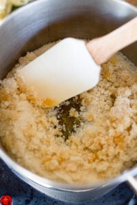 melting sugar down in a saucepan.