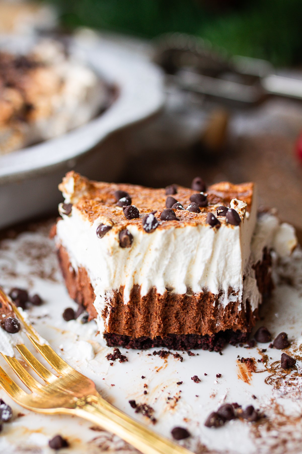 Piece of French Silk Pie with fork marks in it from eating.