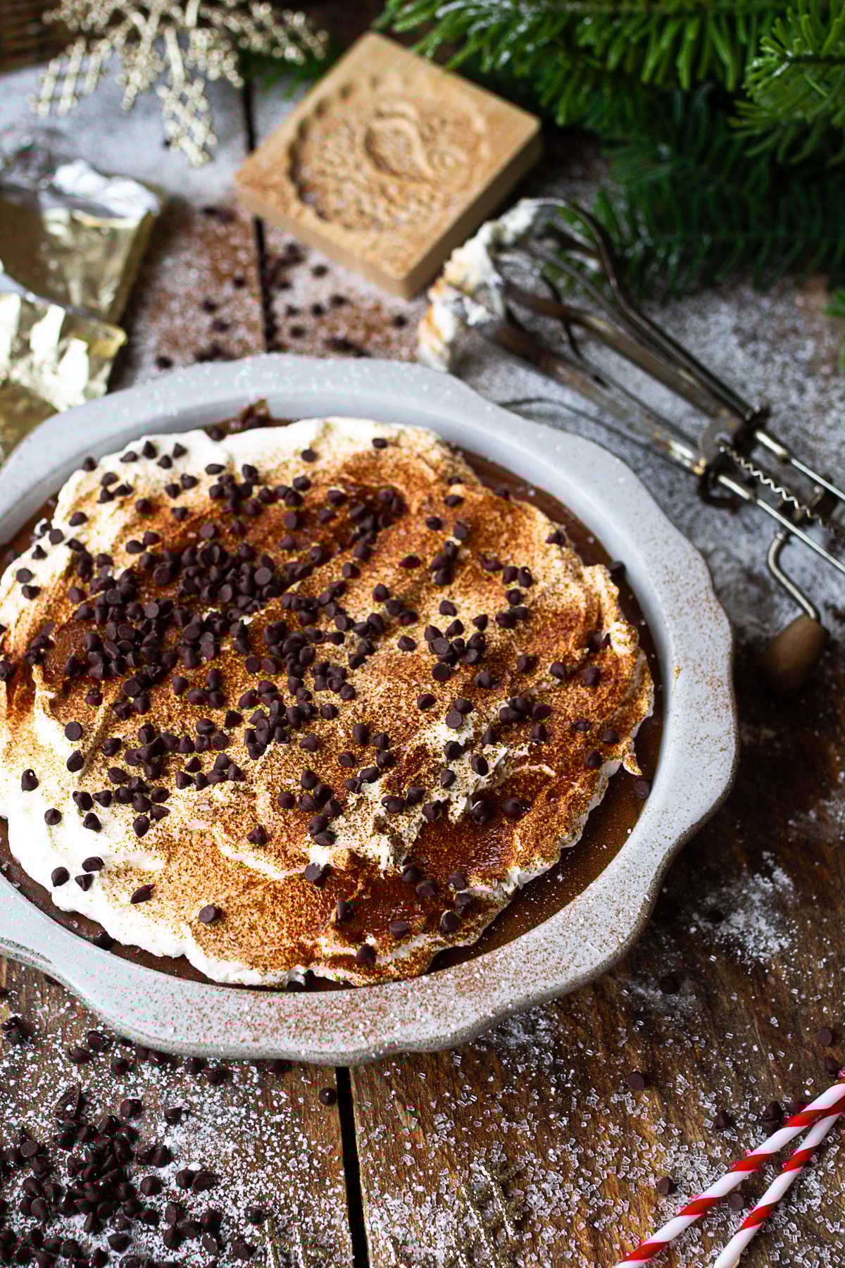 Finished pie garnished with espresso powder and mini chocolate chips.