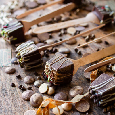 staggered hot cocoa spoons on counter.