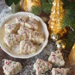 Christmas tree takes on serving dish and counter ready to serve.