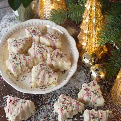 Christmas tree takes on serving dish and counter ready to serve.
