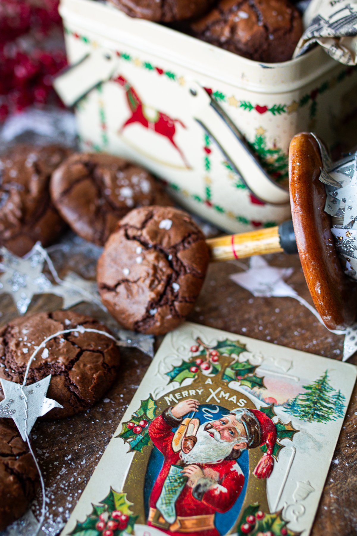 Cookies in Christmas tin on counter ready to enjoy. 