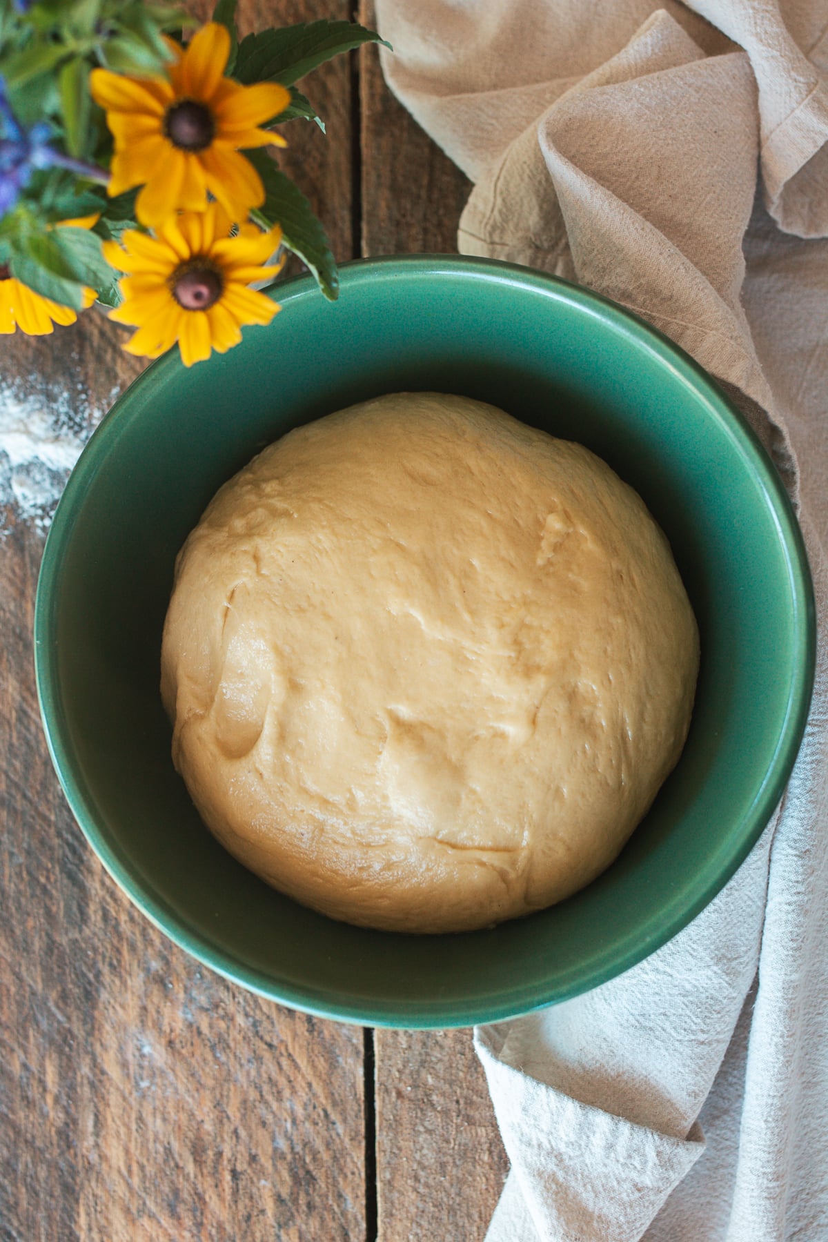 Smooth brioche dough after kneading and butter incorporation.