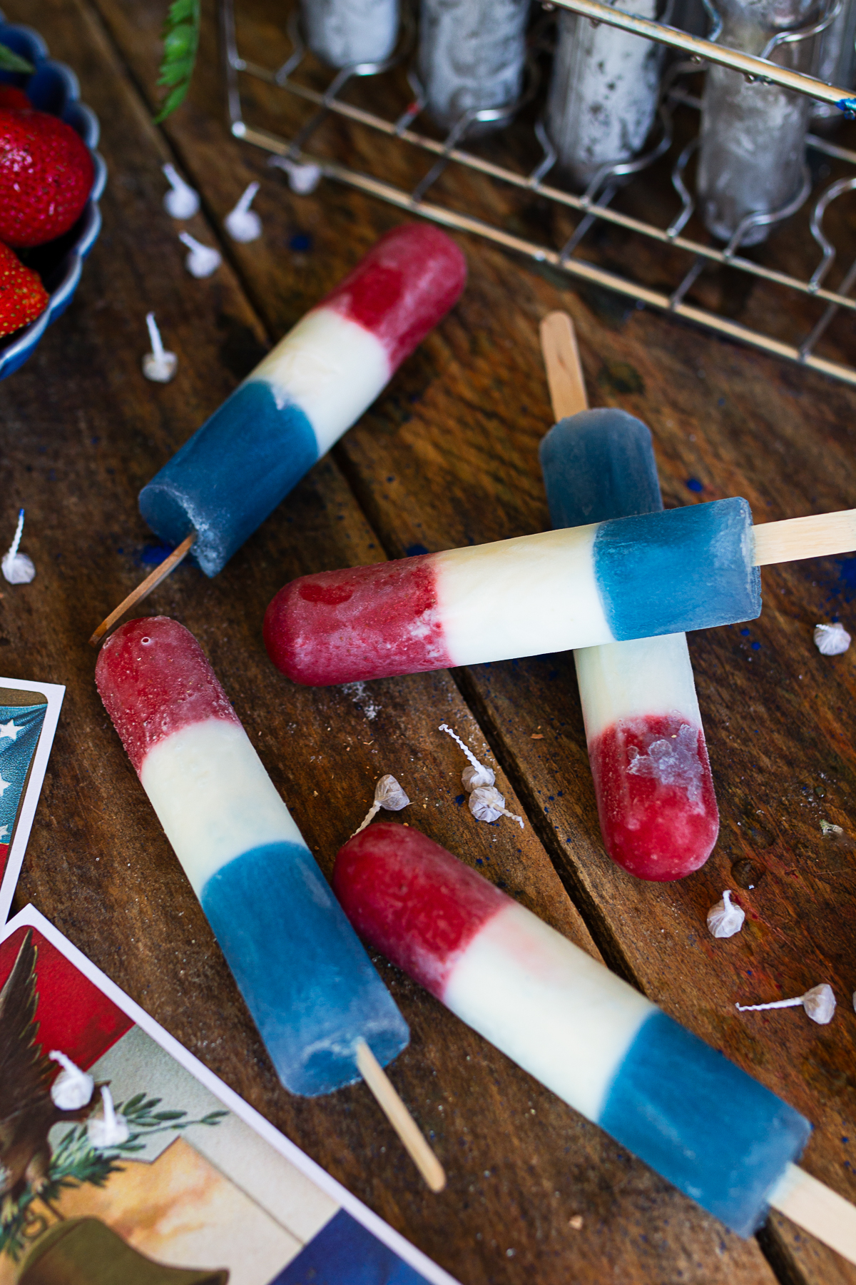 Bring back the magic of summertime childhood memories with these sweet, scratch-made rocket pops! By swapping out artificial dyes for fresh, sun-ripened summer strawberries and natural blue spirulina, you get a beautiful, festive treat that is bursting with pure fruit flavor and wholesome ingredients.